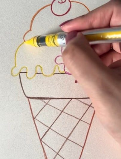 Coloring and outlining a simple drawing of an ice cream cone