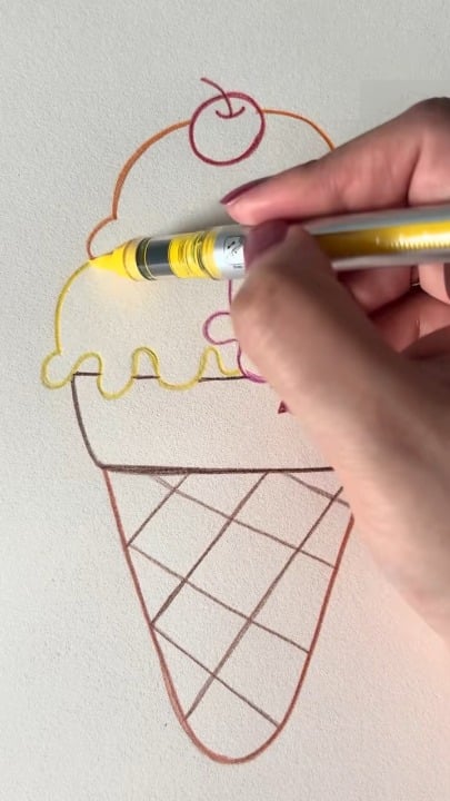 Coloring and outlining a simple drawing of an ice cream cone