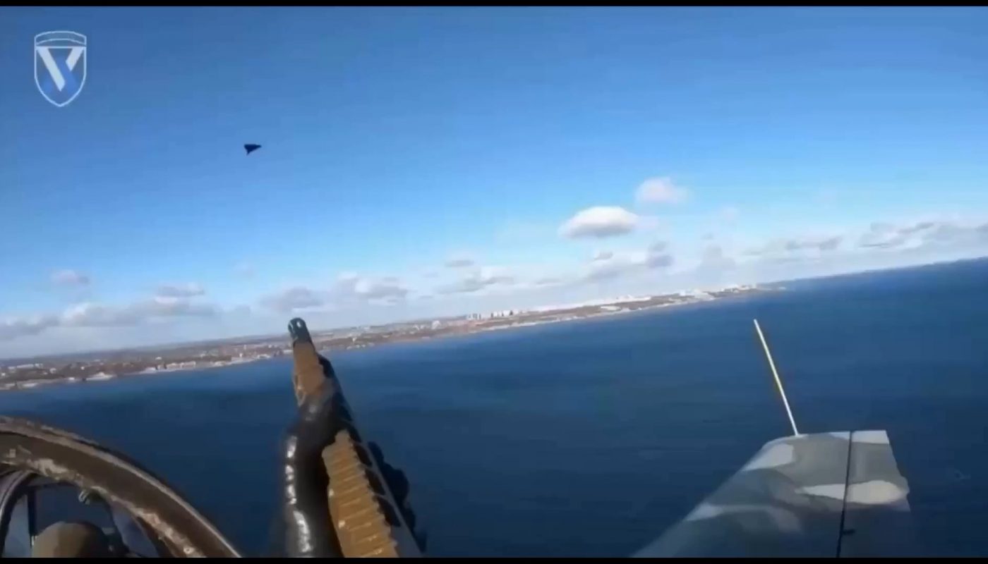 Compilation showing the perspective of a Ukrainian gunner from the back of a Soviet-era Yak-52 trainer plane shooting down unmanned Russian drones with his rifle.