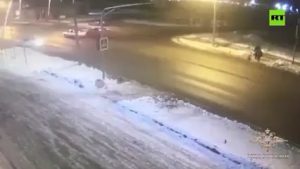 Cops in car intervene and deflect a driver from running over pedestrians