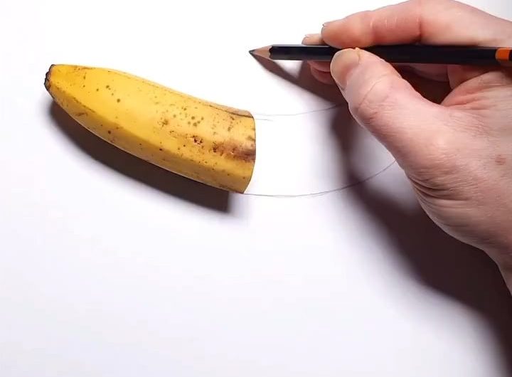 Drawing a Banana Next to a Real Banana