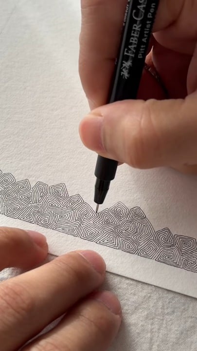 Drawing intricate concentric spirals with a Faber-Castell Pitt Artist Pen