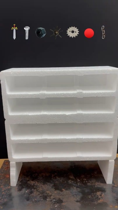 Dropping red hot metal shapes through a polystyrene foam shelf