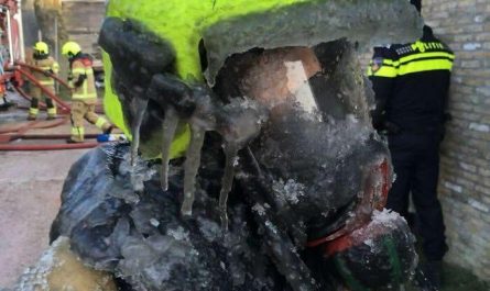 Dutch Firefighter After Dousing A Fire In Freezing Conditions