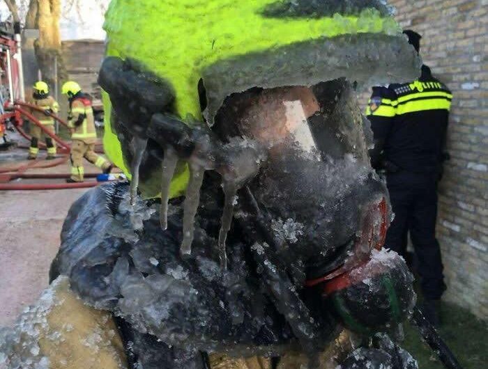 Dutch Firefighter After Dousing A Fire In Freezing Conditions