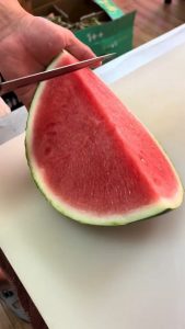 Effortlessly cutting a watermelon into almost-square pieces