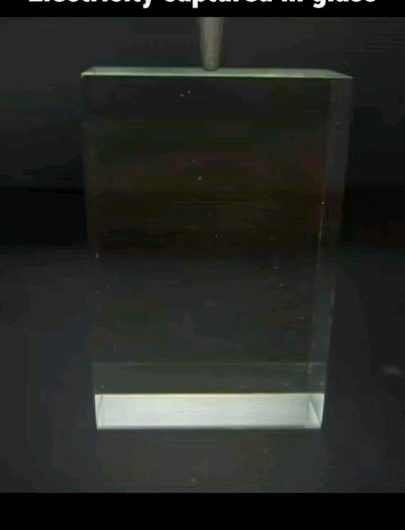 Ever seen what electricity looks like when it gets stuck inside an insulator?