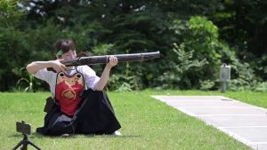 Everyone forgets that Samurais had guns. Here is a Japanese woman firing a massive feudal Ō-zutsu matchlock