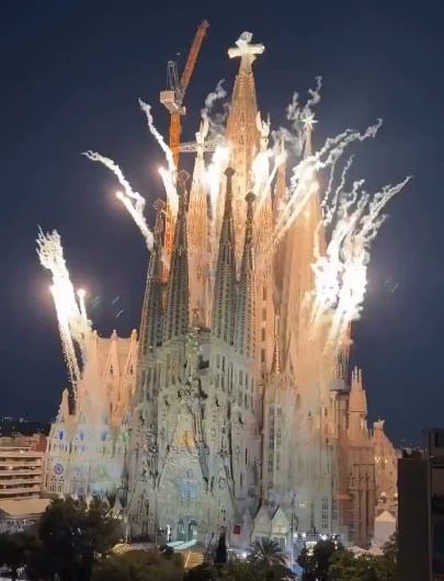 Fireworks celebrating the completion of the 566ft Tower of Jesus Christ at the Sagrada Família