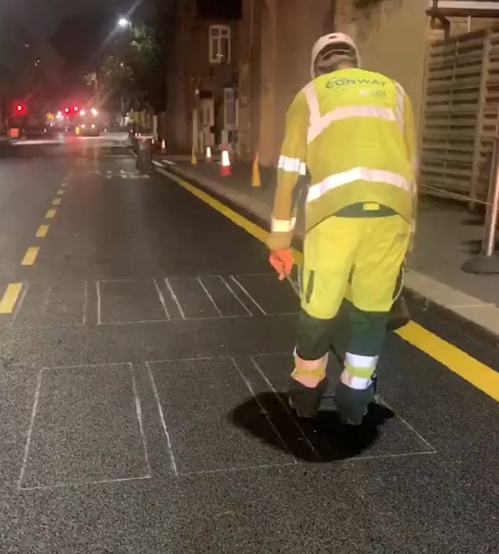 How road lines are painted in the uk