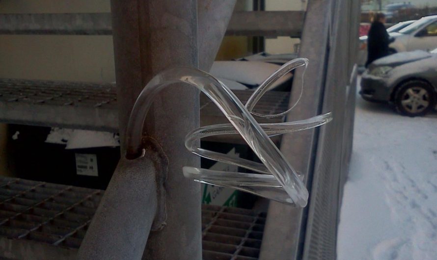 Ice expanding from a hole in a pipe