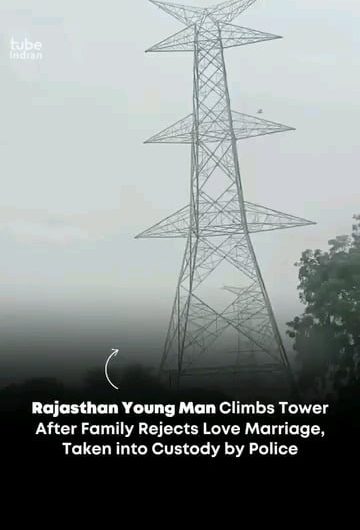 Indian Man’s dramatic 300-foot climb on a high-voltage tower draws a crowd.