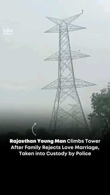 Indian Man's dramatic 300-foot climb on a high-voltage tower draws a crowd.