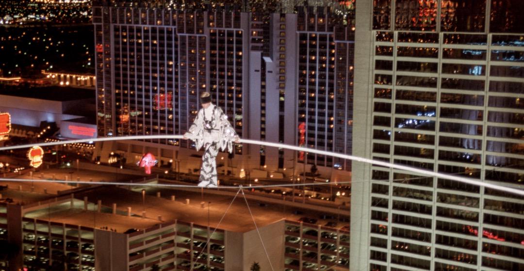 Jay Cochrane, famous tightrope walker, walks across the two buildings of the Flamingo Hilton hotel in Las Vegas while blindfolded  (1998)