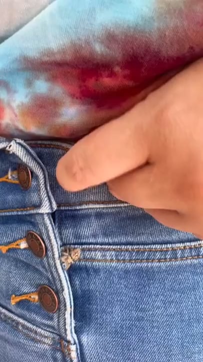 Jumping spider climbs a lady's leg so she sics it on a fly