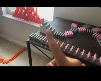 Kid playing Dominoes