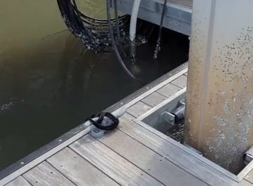 Live electrical wires underwater in the docks