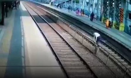 Man losses his shoe while crossing a railway track , goes back to pick up the shoes while the train is dangerously close gets slapped by the officer at the end