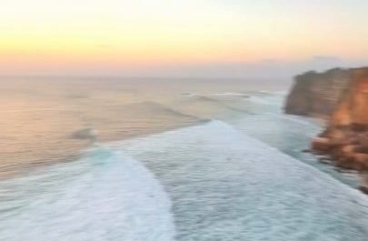 Moving just above the ocean