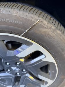 My brother-in-law had a drill bit pierce the exterior of his tire but did not puncture it