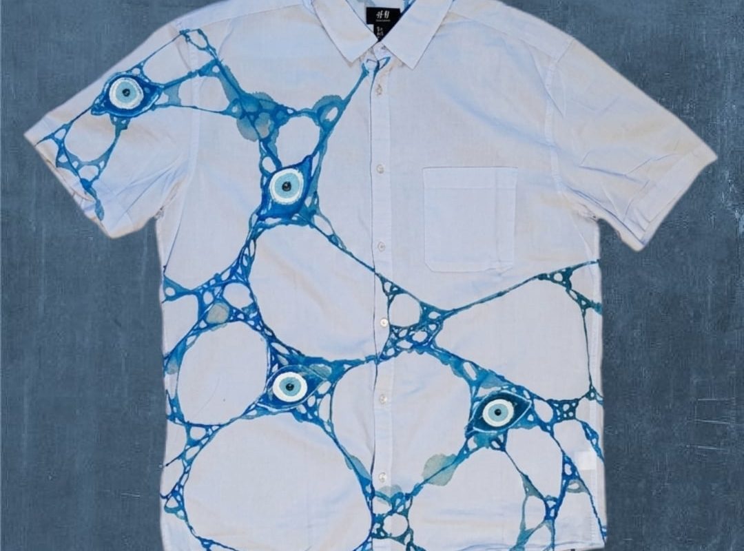 My completely freehand, hand-painted "Evil Eye" shirt. No stencils or prints used, just hours of brushwork.