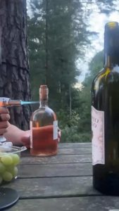 Opening a bottle with fire