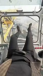 POV: Leaving the cabin of a tower crane after a long shift.