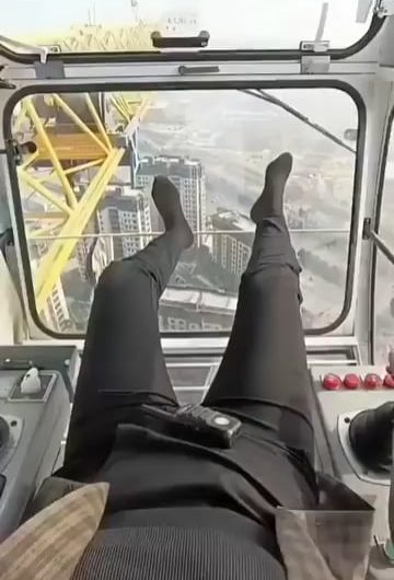POV: Leaving the cabin of a tower crane after a long shift.