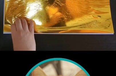 Peeling the foil off my drawing of Dori the orange cat (oc)
