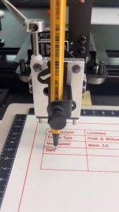 Pen plotter drawing an SR-71 Blackbird with a fine liner pen