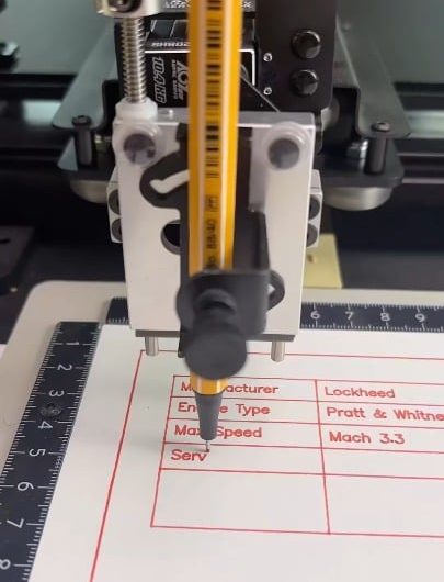 Pen plotter drawing an SR-71 Blackbird with a fine liner pen