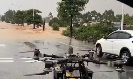 People are being rescued by drones in floods in Southeastern China.