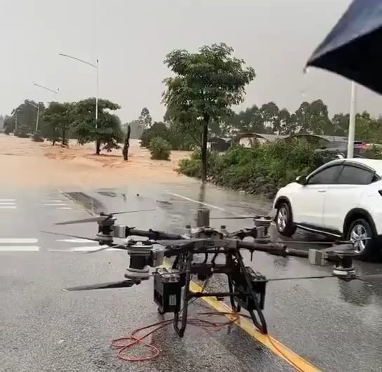 People are being rescued by drones in floods in Southeastern China.