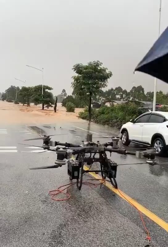People are being rescued by drones in floods in Southeastern China.