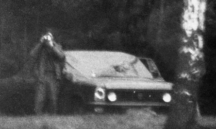 Photo of an East German Stasi agent taking a photo of a CIA agent taking a photo of him at the same time