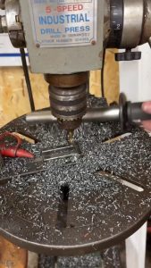 Picking up metal filings with a magnetic picker