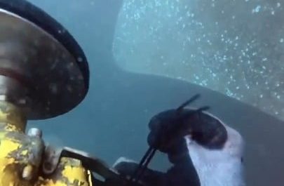 Polishing a ships propeller