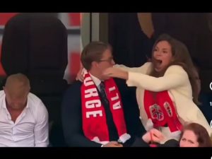 Princess and her brother, Prince of Norway celebrating Norways win over Brazil.