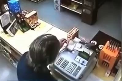 Robber pulls gun, clerk is faster