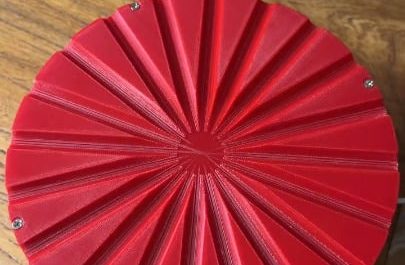 Rolling steel ball bearings into radial channels