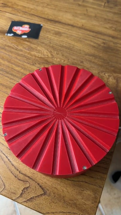 Rolling steel ball bearings into radial channels