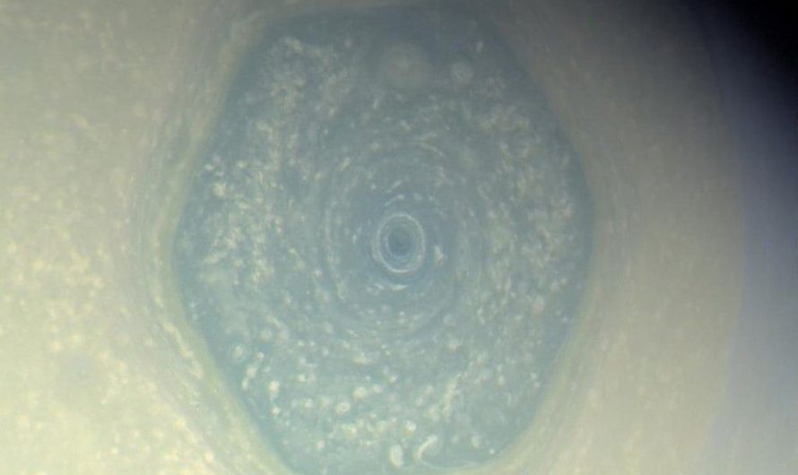 Saturn’s north pole is home to a giant hexagonal storm about 30,000 km (18,600 miles) wide—large enough for more than two Earths to fit inside. First spotted in 1980, it’s still raging today.