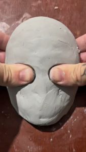 Sculpting a face from clay using only fingers
