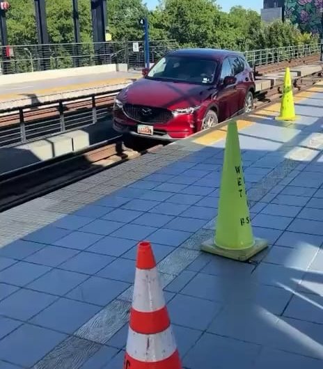 Seattle light rail service was suspended after a driver somehow got their SUV onto the tracks 30 feet above street level