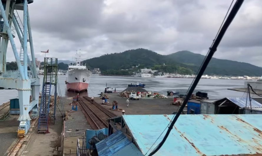 Ship being pulled into a drydock