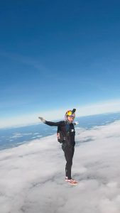 Skydiver appears to walk on clouds