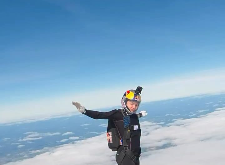 Skydiver appears to walk on clouds