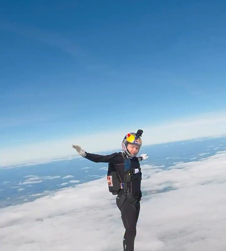 Skydiver appears to walk on clouds