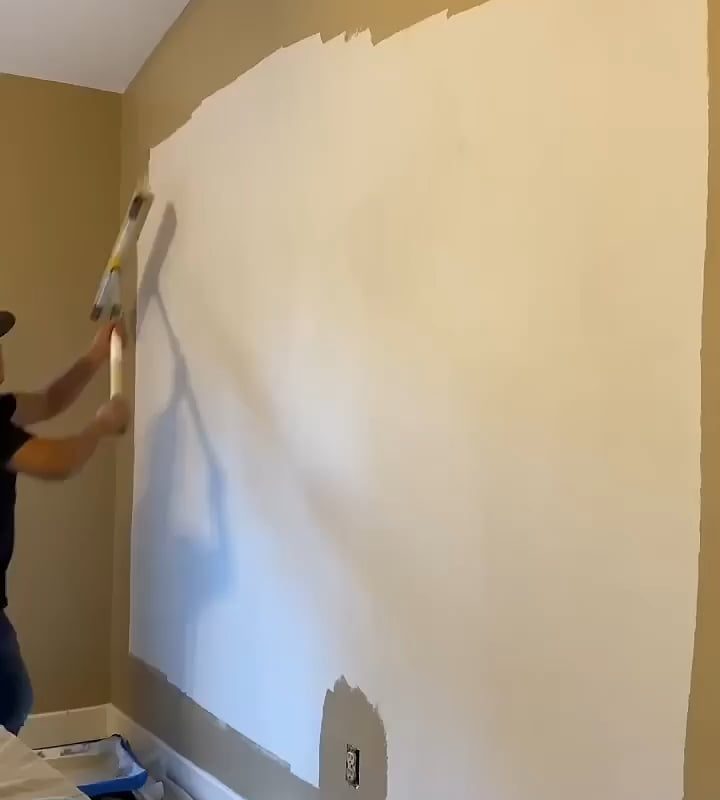 Speed painting a wall with an 18in roller