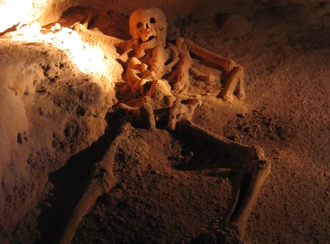 The Crystal Maiden of Actun Tunichil Muknal is a complete skeleton covered in stalactites, found in a ceremonial Maya cave in Belize. Archaeologists believe it belonged to a young man who was a sacrificial victim, and over the years, his remains became entirely coated in a crystal-like layer.